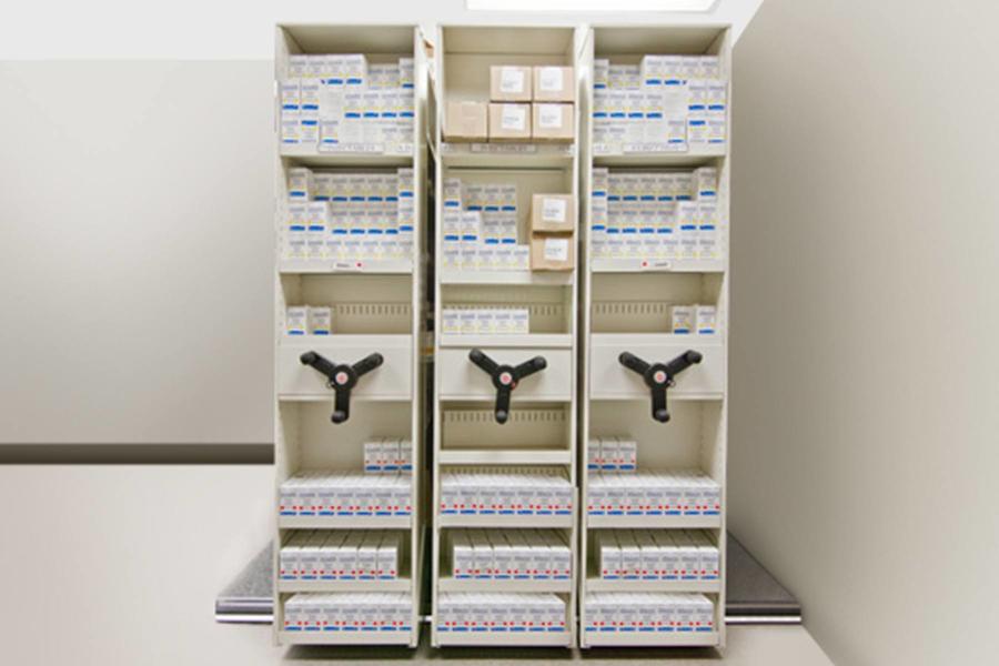 Compact shelving system for storing medical supplies.