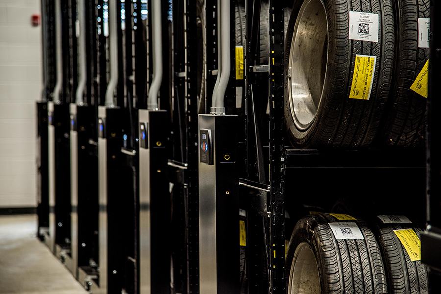 Black Montel shelving system with tires, equipped with electronic controls to facilitate shelf movement.