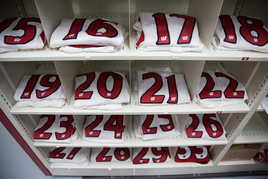 Storage for football team jerseys, organized by number.