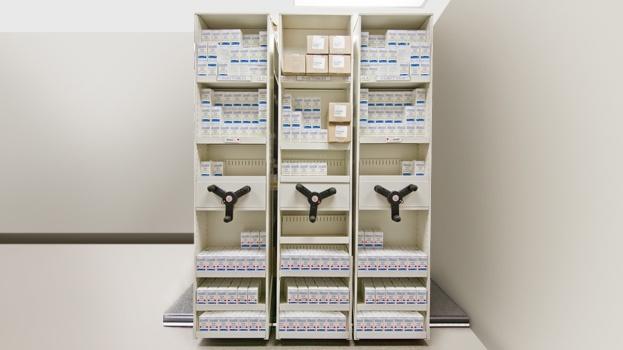 Compact shelving system for storing medical supplies.