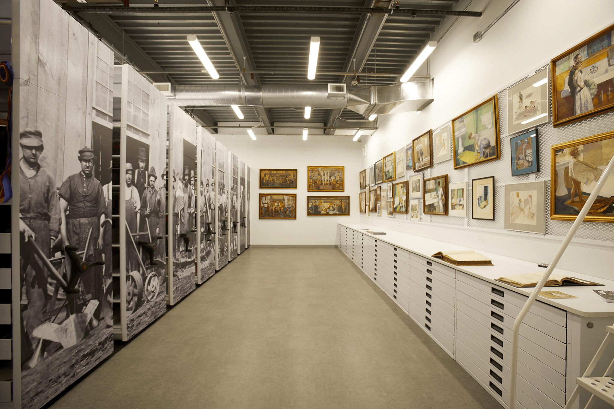 Archive room equipped with Montel shelving featuring historical archive prints on the panels.