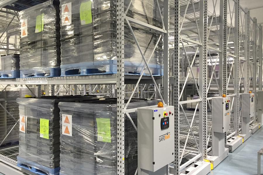 Pallets stored on shelves with SafeRak safety system.