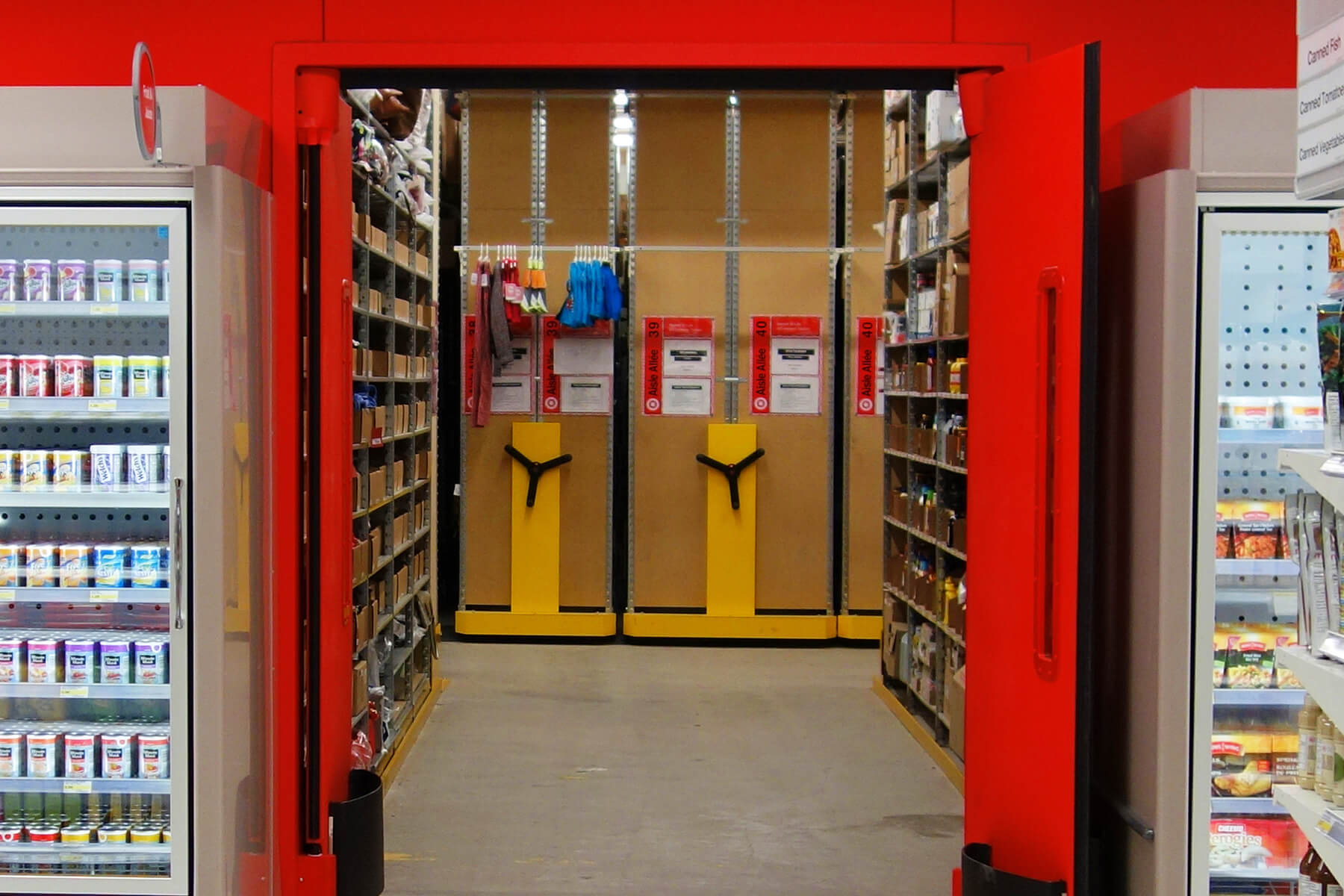 Montel mobile shelving system in a warehouse with optimized shelves for stock organization.