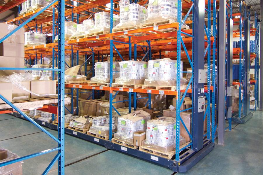 Plastic-wrapped pallets in a SafeRak shelving system.