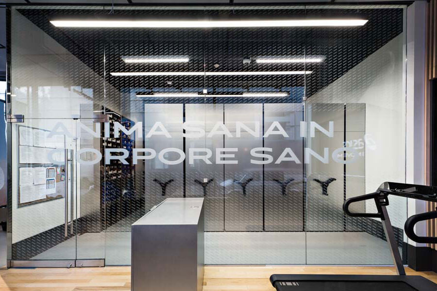 Entrance to a storage area with an inspiring message on the glass.