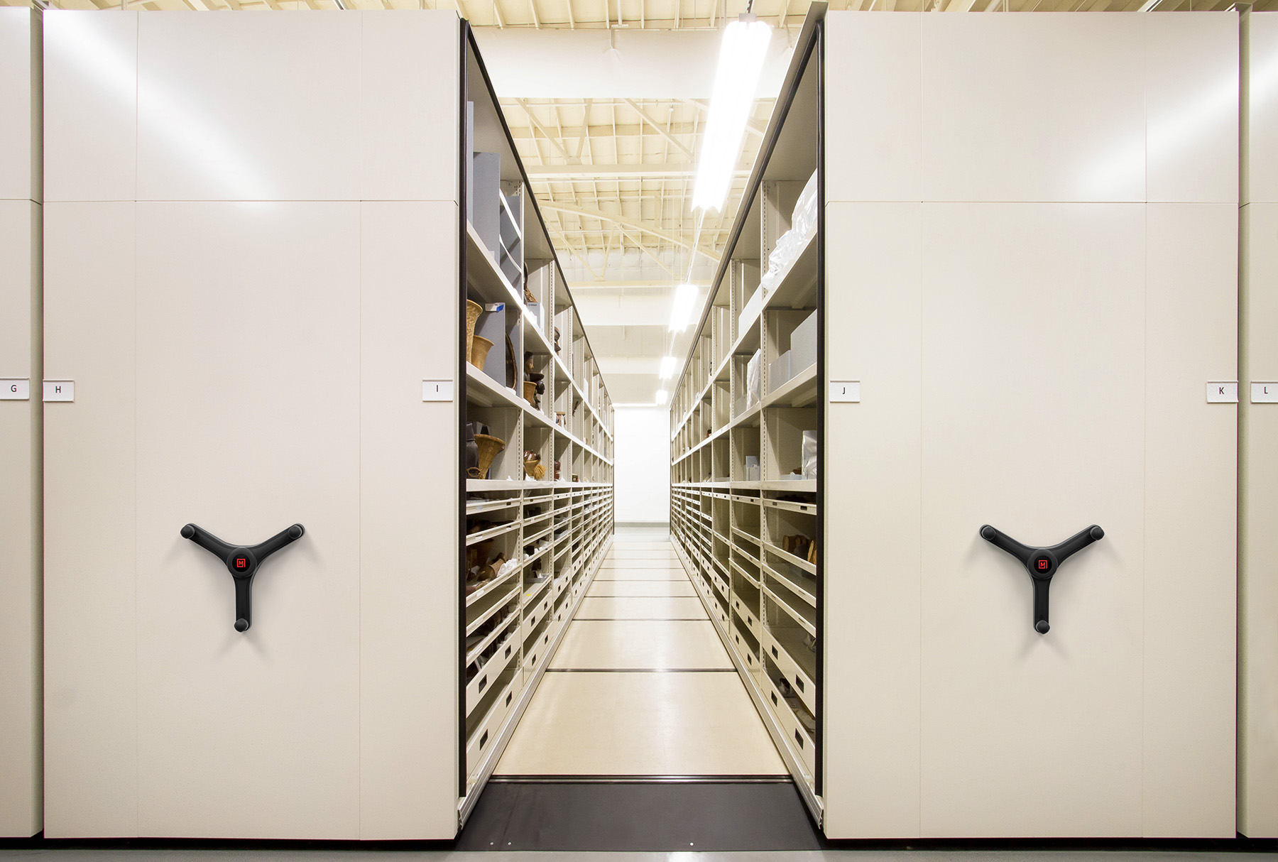 Sports helmet storage system at Montel, with sliding shelves.